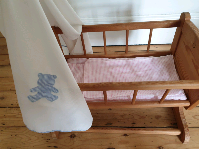 dolls swinging crib